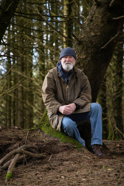 istock Senior man resting in woodland 1480527802