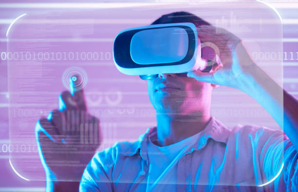 istock Futuristic data, virtual reality and man in metaverse exploring a cyber world. Digital transformation, neon technology and male touching ux button for trading, stock market or vr, binary or software. 1480543536