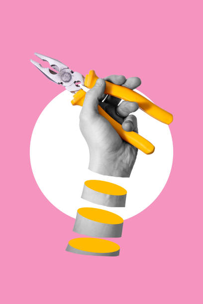 istock Art collage, A man's hand holding yellow pliers, on a pink background. 1480547165