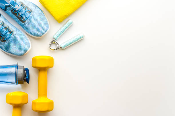 istock Sport background with sneakers and dumbbells, top view 1480550837