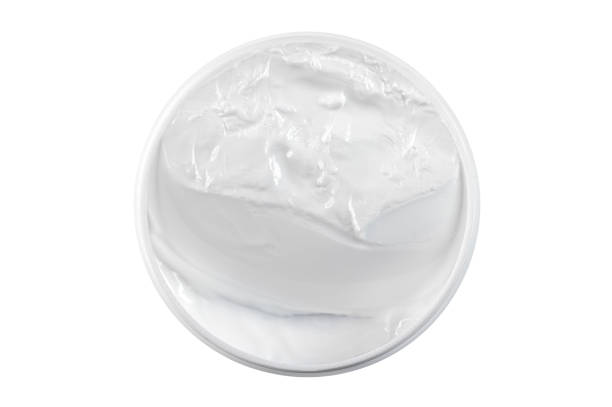 istock Jar, container with white universal cosmetic cream for face, body with blank clean surface isolated on white, top view 1480557320