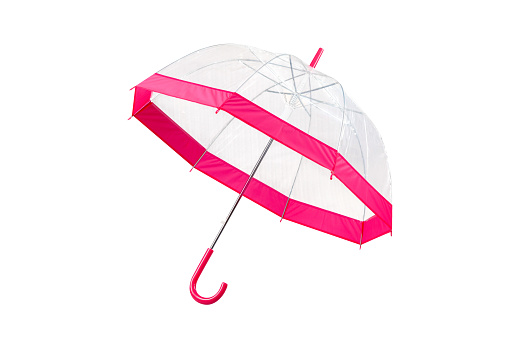 Opened transparent umbrella with pink details isolated on white background, cut out, clipping path, studio shot