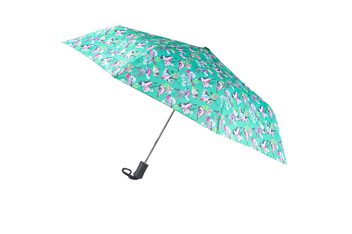 Opened turquoise colored umbrella with pattern isolated on white background, cut out, clipping path, studio shot
