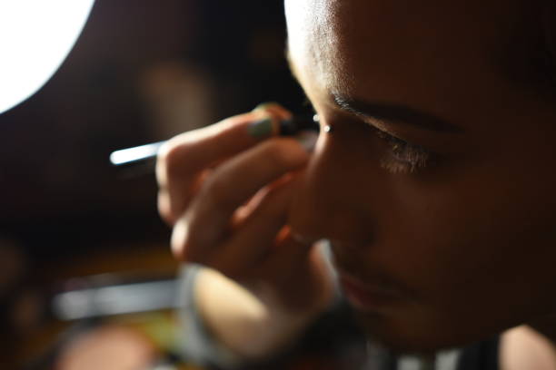 istock Drag queen person applying makeup in dressing room 1480566016