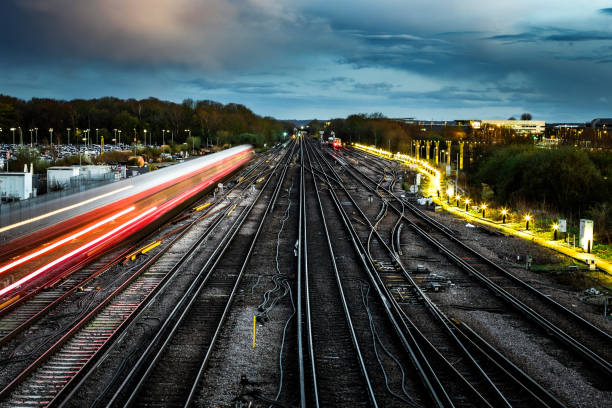 istock Blurred motion of passenger train in early evening 1480566940