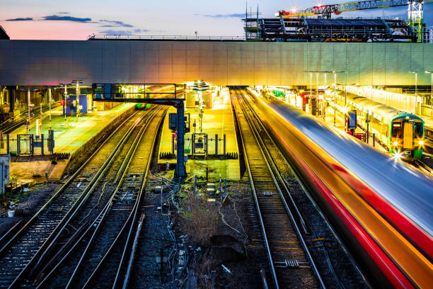 istock Blurred motion of passenger train in early evening 1480566942