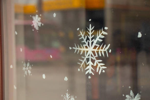 istock painted snowflake on a window in winter 1480569808