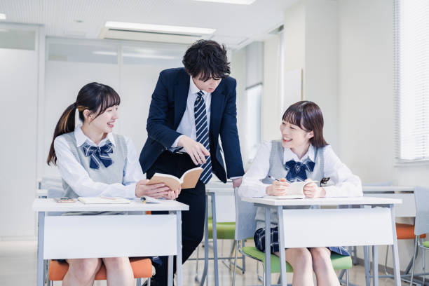 istock A high school student receiving guidance from her teacher 1480569818