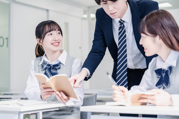 istock A high school student receiving guidance from her teacher 1480569822