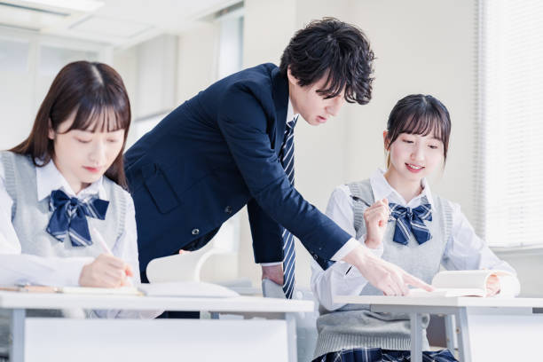 istock A high school student receiving guidance from her teacher 1480569831