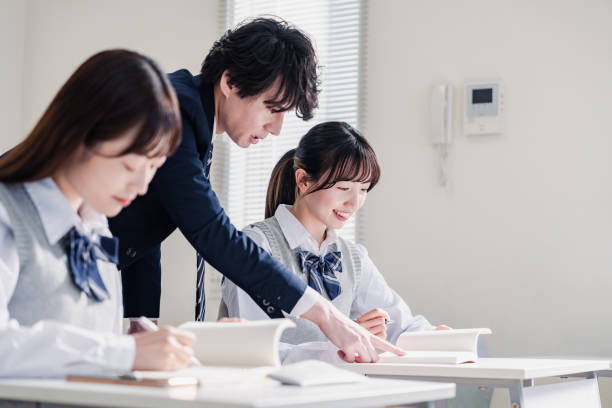 istock A high school student receiving guidance from her teacher 1480569839
