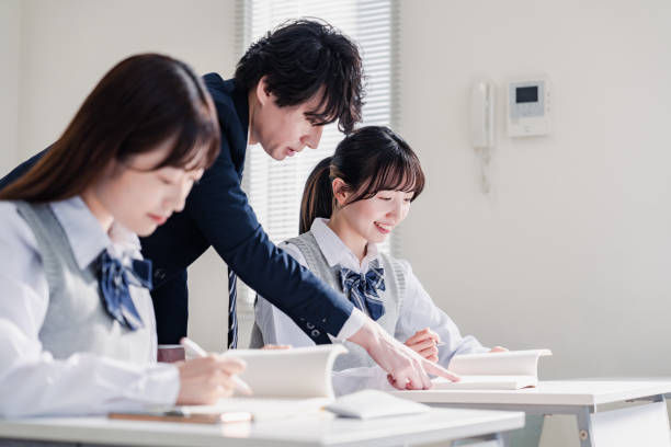 istock A high school student receiving guidance from her teacher 1480569845