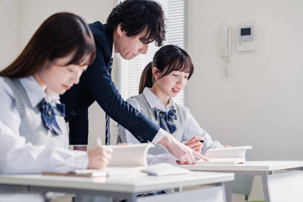 istock A high school student receiving guidance from her teacher 1480569850
