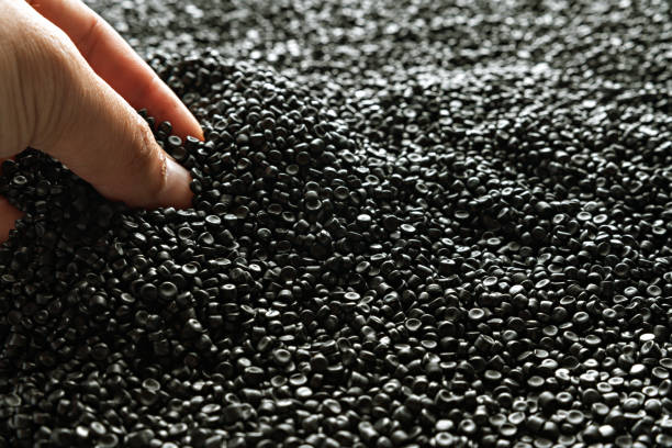 istock Small pieces of crushed plastic. Crushed bottle caps for recycling. Plastic waste that will be mixed with plastic vergin. Concept reducing plastic. 1480569924