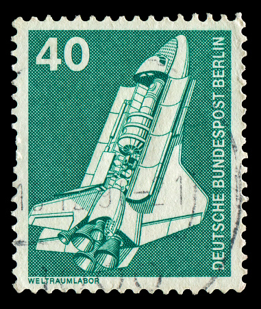 Germany stamp: Air mail -  Airplane flying in the sky