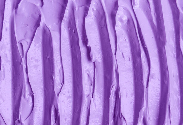 istock Purple clay (alginate face mask, body wrap, hair shampoo, conditioner) texture close up, selective focus. Abstract lavender background with brush strokes. 1480571845