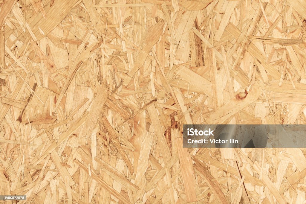 Bright contrasting background of chipboard rough texture yellow Bright contrasting background of chipboard rough texture yellow. Abstract Stock Photo