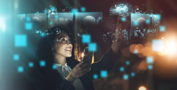 istock Woman, tech overlay and phone in night at office for finance research, data analytics or digital job. Cybersecurity expert, fintech or focus in dark workplace with 3d hologram abstract with happiness 1480574764