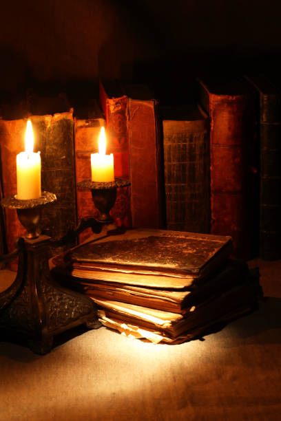 istock Old Books And Candles 1480576528