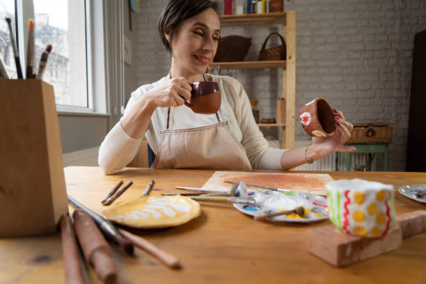 istock Ceramist artist female work in studio 1480578740