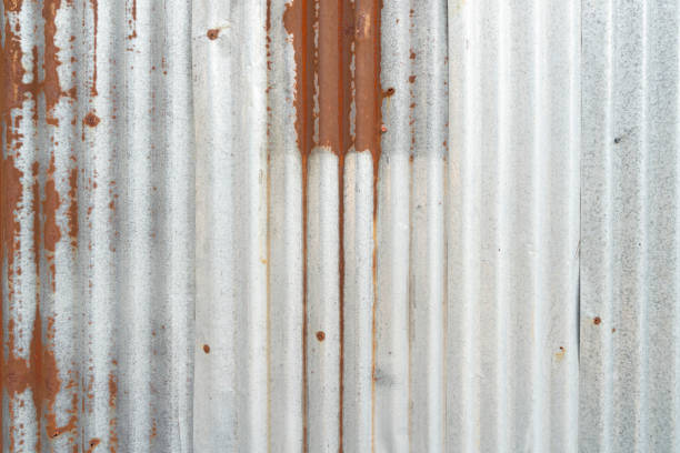 istock The Rusty zinc sheet texture and background, Reddish brown stain on metallic silver 1480578749