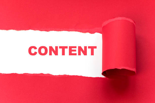 istock Tear the red paper revealing word CONTENT 1480582331