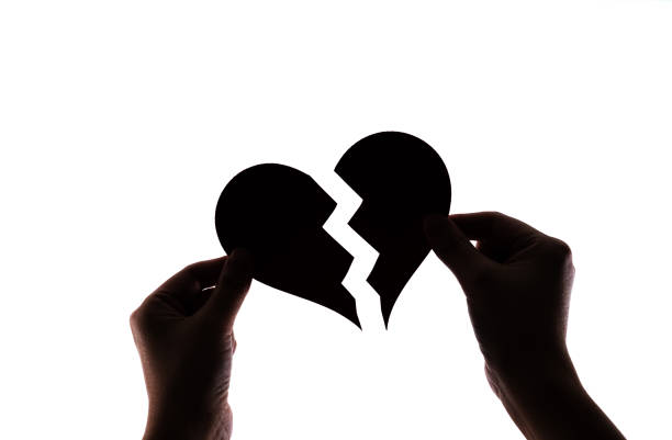 istock Woman hands holding broken heart 1480592311