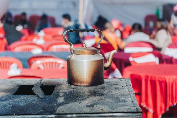 Cooking Tea in Traditional Nepali tea pot or chai pot in Kathmandu. Nepali Tea , Nepali Chiya