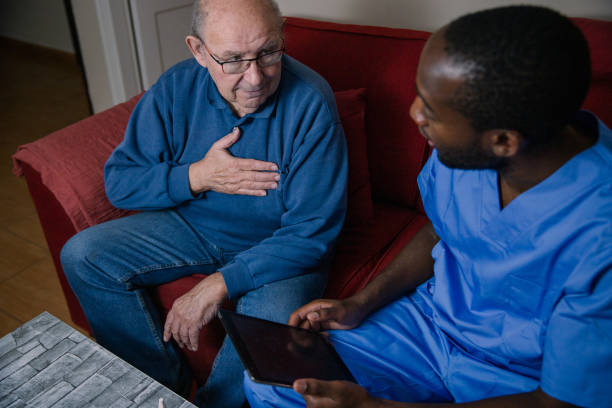 istock An African-American doctor conversing with his elderly patient whose chest hurts 1480594776