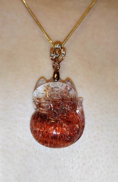 istock Super seven golden strawberry crystal pendant 1480595466