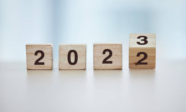 istock Calendar, 2023 countdown and wooden blocks on empty table in grey studio background for goals or resolution. New year, celebrate and start for corporate growth or new change motivation with toy block 1480596278