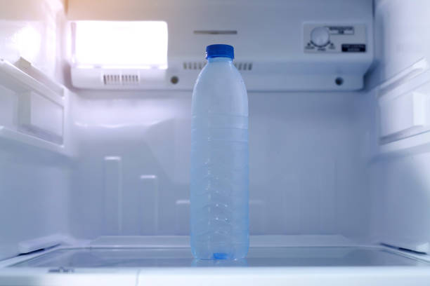 istock Cold drinking water bottles in the refrigerator 1480597180