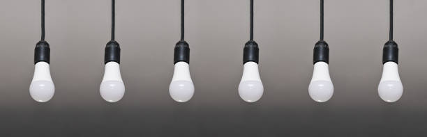 istock six LED lamps hang on wires in one row 1480598712