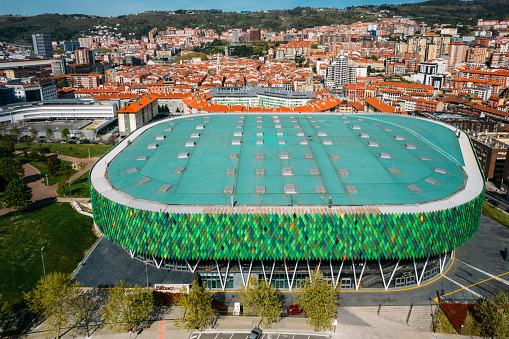 Bilbao, Spain - April 5, 2023: Aerial drone facade view of Bilbao Arena, an indoor arena that has the capacity to host 10,000 people for basketball games or concerts