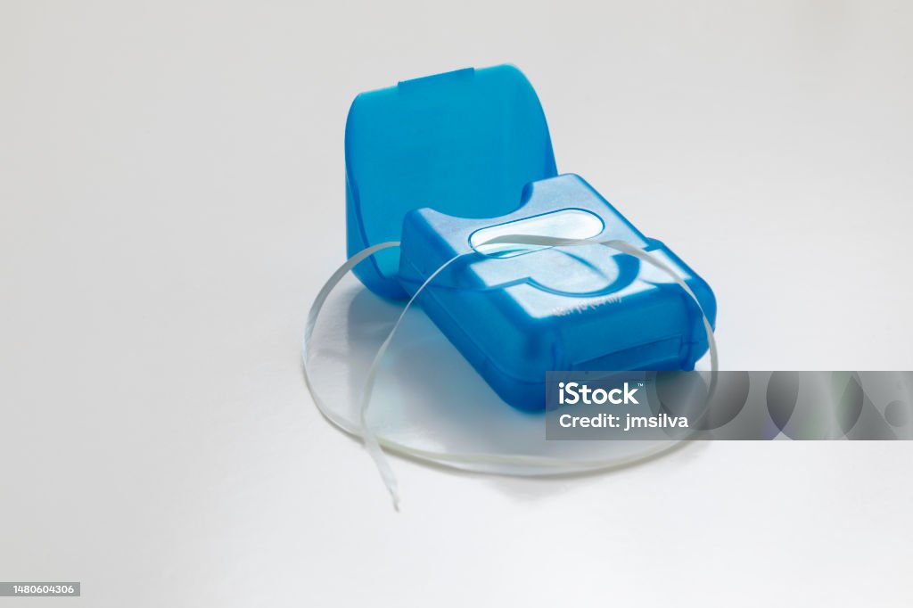 Dental Floss Container On A White Background Stock Photo - Download Image  Now - Care, Clean, Close-up - iStock