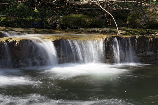Small waterfalls of the River Yera as it passes through Vega de Pas (Cantabria)