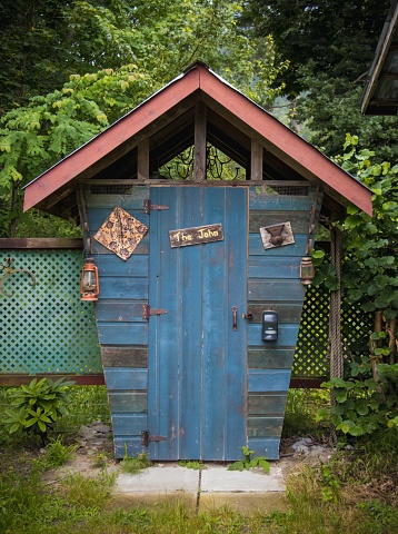 An outhouse is a small structure, separate from a main building, which covers a toilet. This is typically either a pit latrine or a bucket toilet, but other forms of dry toilets may be encountered.