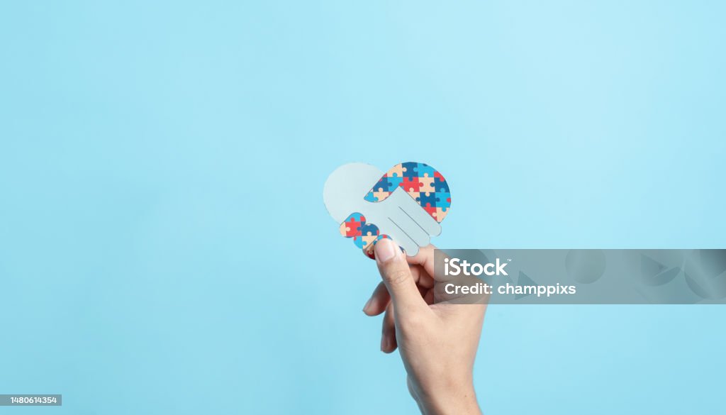 Hand Puzzle Symbol Paper Cut Out Of Awareness For Autism Spectrum