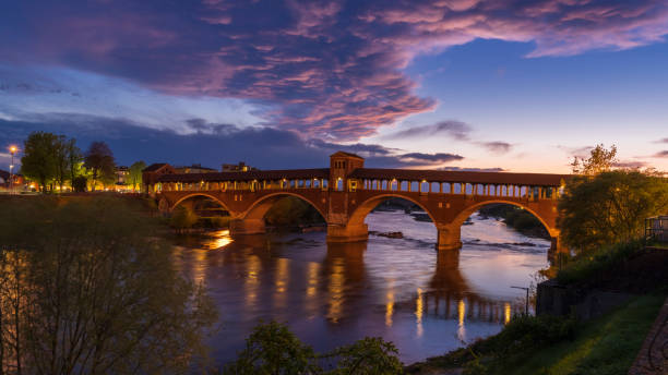 istock Ponte Coperto (covered bridge) over Ticino river in Pavia at blue hour 1480615175