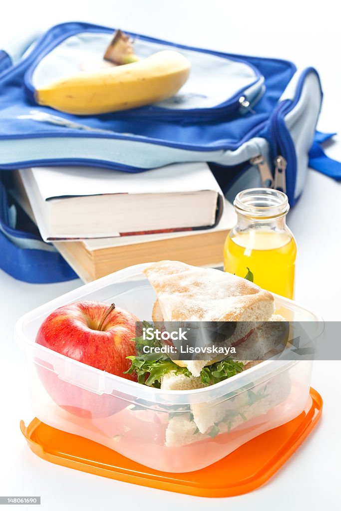 Lunch box with sandwich Lunch box with sandwich, apple and juice Apple - Fruit Stock Photo