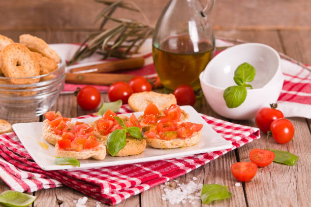 istock Friselle with cherry tomatoes and basil. 1480616978
