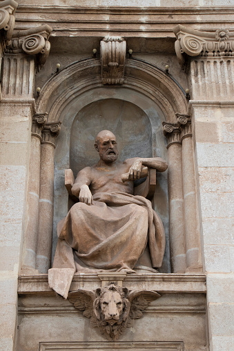 Sliema, Malta - November 12, 2022: Sculpture in an outdoor niche on Jesus of Nazareth parish Church