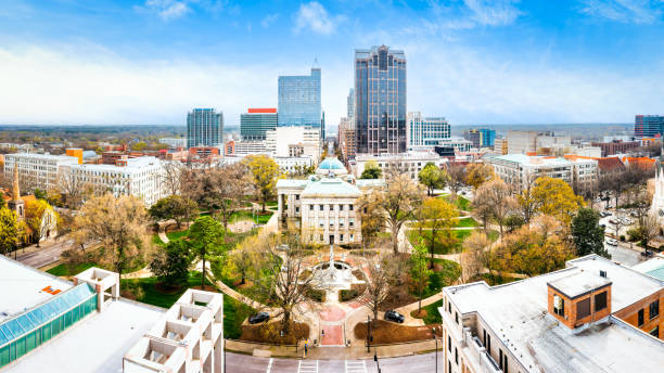North Carolina State Capitol and Raleigh skyline Drone panorama of the North Carolina State Capitol and Raleigh skyline local landmark stock pictures, royalty-free photos & images