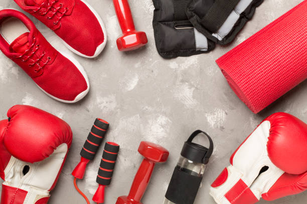 istock Red sport equipment on concrete background, top view 1480625500