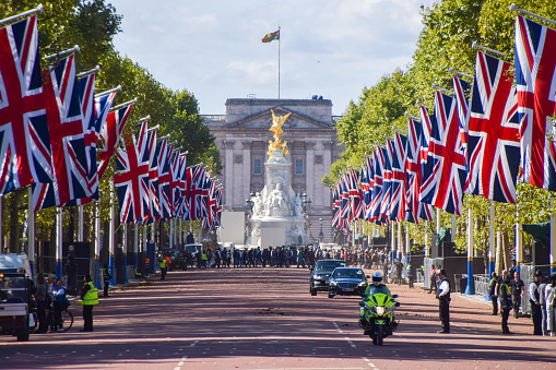 London, UK - September 17 2022:  Union Jacks decorated The Mall, with a view of Buckingham Palace.