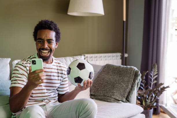 istock Winning an online bet on a soccer game 1480630508