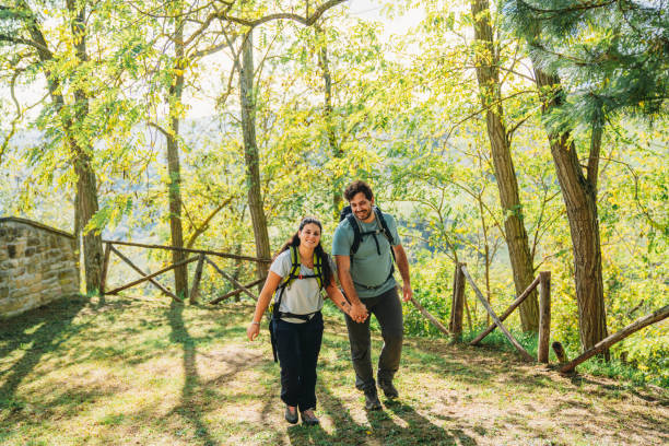 istock A couple is walking on a footpath in the forest holding hands 1480630735