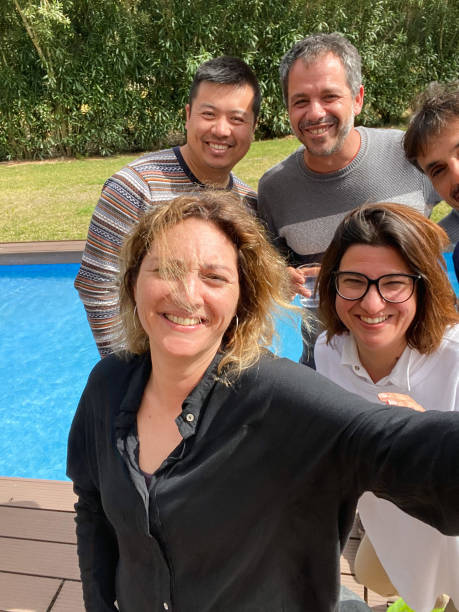 istock Friends in cool attitude laughing and taking a selfie 1480633265