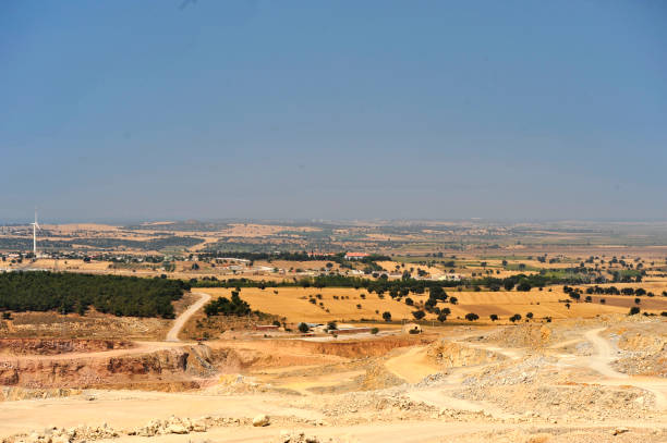 istock view from open pit mine to a windmill and surrounding 1480637540