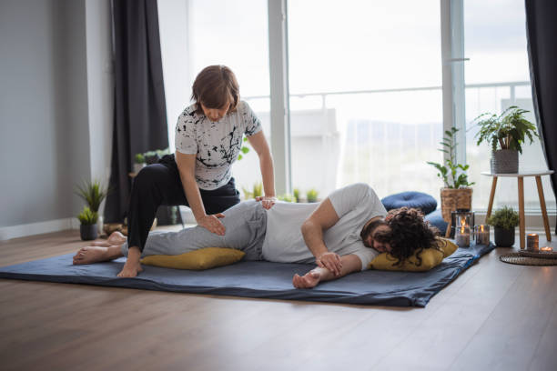 istock Therapist helping patient's recovery with Shiatsu massage 1480641718